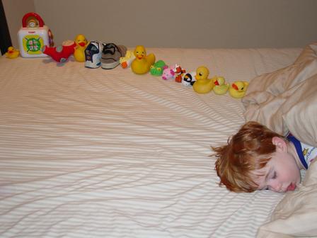 File:Autistic-sweetiepie-boy-with-ducksinarow.jpg