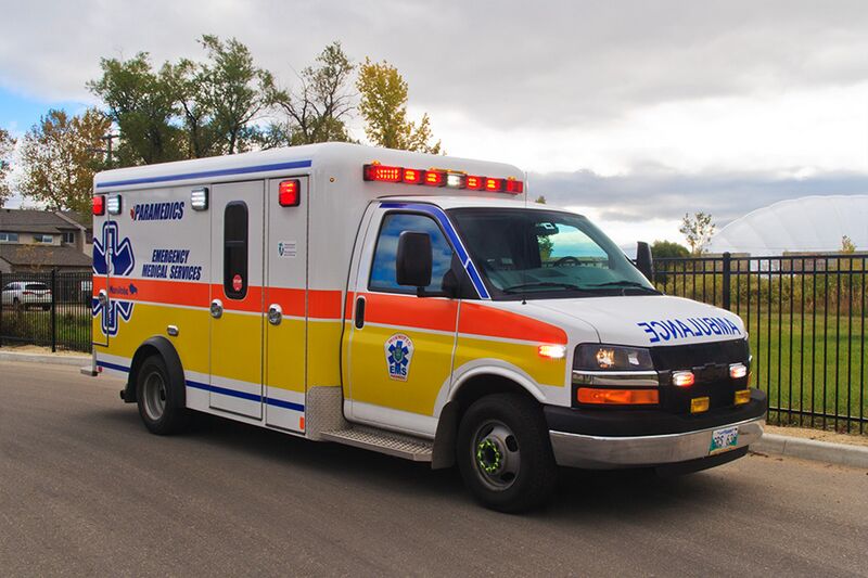 File:WEMS ambulance sidefront.jpg