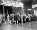 Unemployed men queued outside a depression soup kitchen opened in Chicago by Al Capone