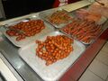 Street vendor selling various local sausages in Manila, Philippines.