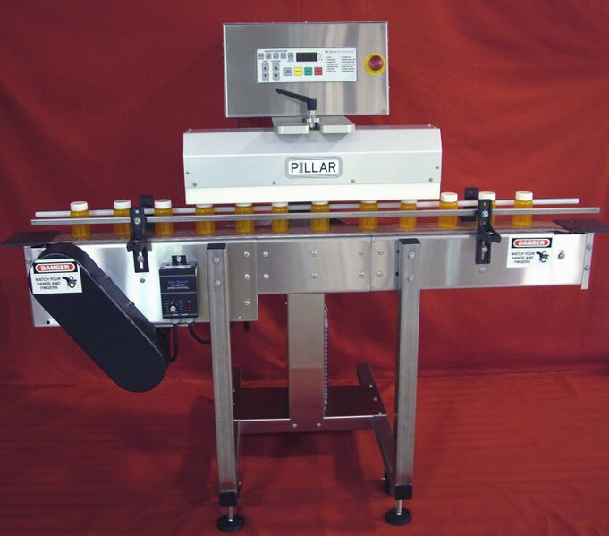 File:Induction sealer conveyor.jpg